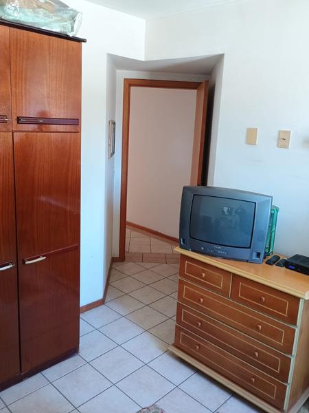 Apartamento de 3 dormitórios (suíte), dependência completa e 2 garagens em capoeiras.