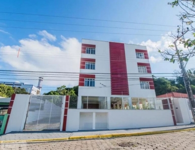 Apartamento de 50m² com dormitório e Garagem.